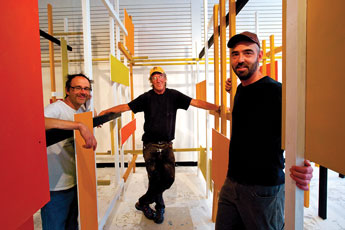 Steve Storz, Fitz Sargeant and Dan Philips stand in a new art installation at the Art 123 Gallery in downtown Gallup. © 2011 Gallup Independent / Brian Leddy 